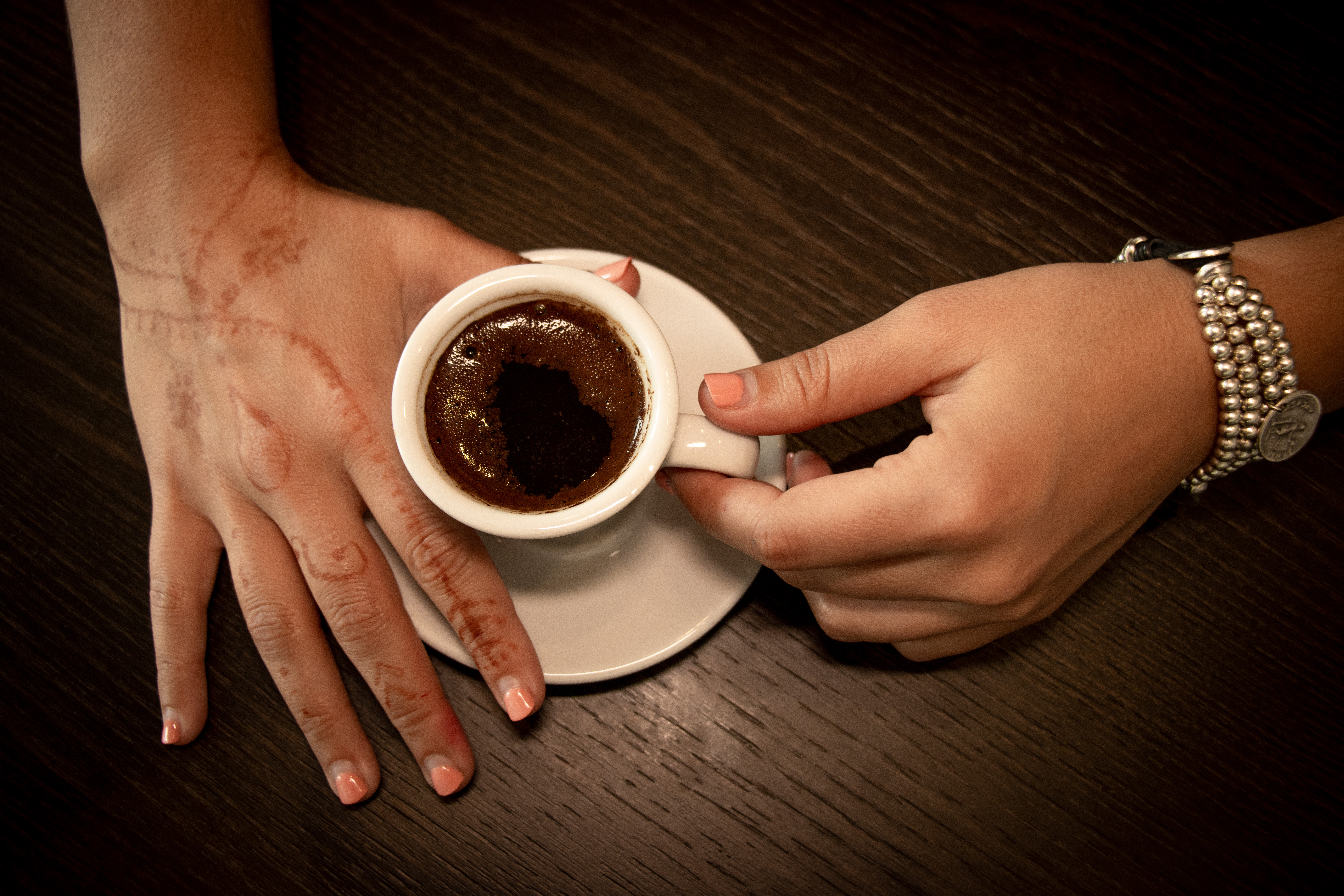 A warm cup of coffee symbolizing a personal conversation